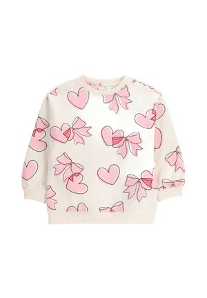 Dziecięcy sweter w kolorze kremowym z różowymi nadrukami serc i kokardek, ściągacze na mankietach i u dołu, odpowiedni do codziennego noszenia.