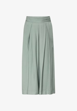 Pantalon vert clair à jambes larges, taille haute avec plis devant, réalisé en tissu texturé, présenté sur un fond blanc.