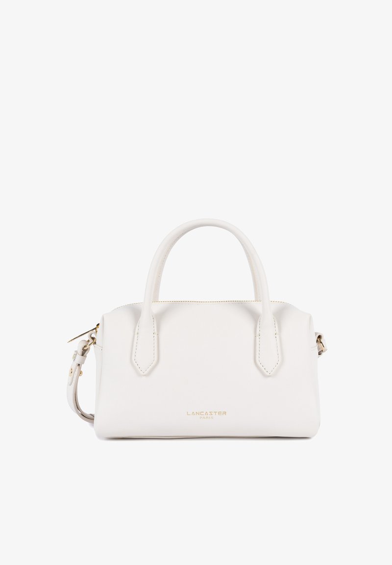 Sac à main en cuir Lancaster Paris blanc avec deux poignées supérieures, bandoulière amovible et fermeture éclair dorée.