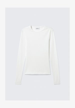 Camicia a maniche lunghe bianca in morbido tessuto, con collo rotondo e orlo dritto. Design minimalista senza motivi o dettagli visibili.
