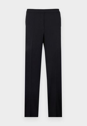 Pantalones de vestir negros de corte recto a medida, con cinturilla plana y pliegues prensados, mostrados sobre un fondo claro y liso.