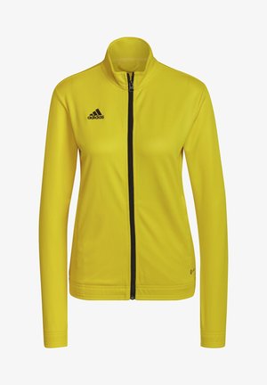 Veste jaune à manches longues zippée avec logo Adidas noir sur la poitrine gauche et col montant, présentée sur fond blanc.