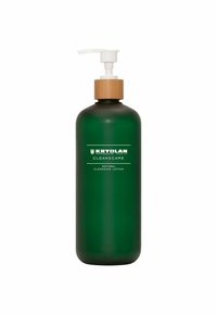 Green glass bottle with a pump dispenser and wooden cap. Label reads "KRYOLAN CLEAN&CARE NATURAL CLEANSING LOTION." Smooth texture.