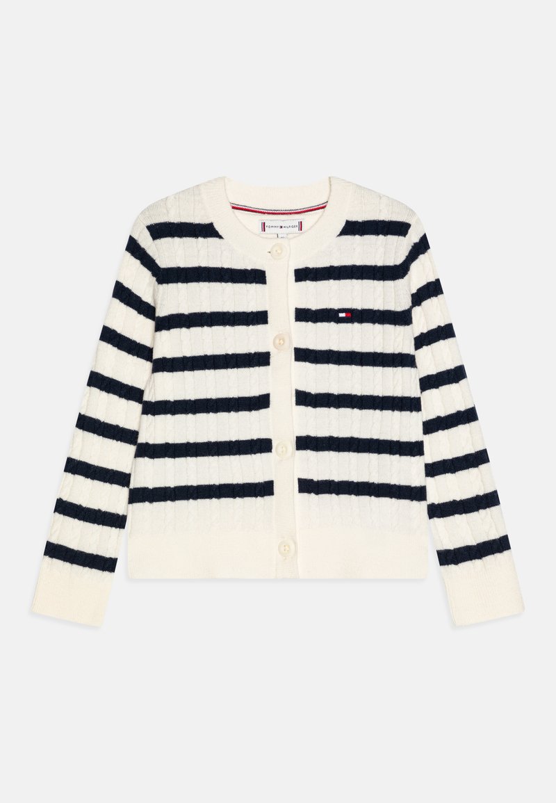 Strikket cardigan med marineblå striper på en elfenbensfarget bakgrunn, knappelukking, rillemønster og liten brodert logo på brystet.