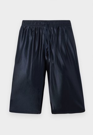 Navy swim shorts made of lightweight, shiny material. Features an elastic waistband with a drawstring, knee-length cut, and no pockets.