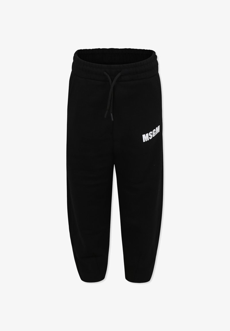Pantalons de survêtement noirs en tissu doux, avec une coupe fuselée, une taille élastique avec cordon de serrage et un logo MSGM blanc sur la cuisse gauche.