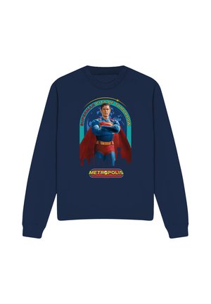 Navy blue sweatshirt with Superman wearing classic costume, red cape, and logo, text "Superman City of Tomorrow" and "Metropolis."