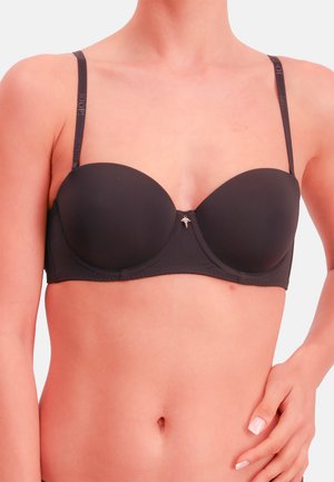 Černá polstrovaná podprsenka s nastavitelnými ramínky, hladkou texturou, kostrou pro oporu a malým ozdobným emblémem ve středu.
