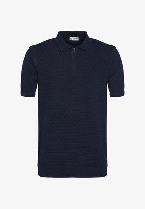 Jūras spēku līmeņkurta ar īsām piedurknēm un ceturtdaļas rāvējslēdzēju, ar teksturētu dimanta rakstu, ribotu apkakli un apakšmalu, izgatavota no viegla auduma.