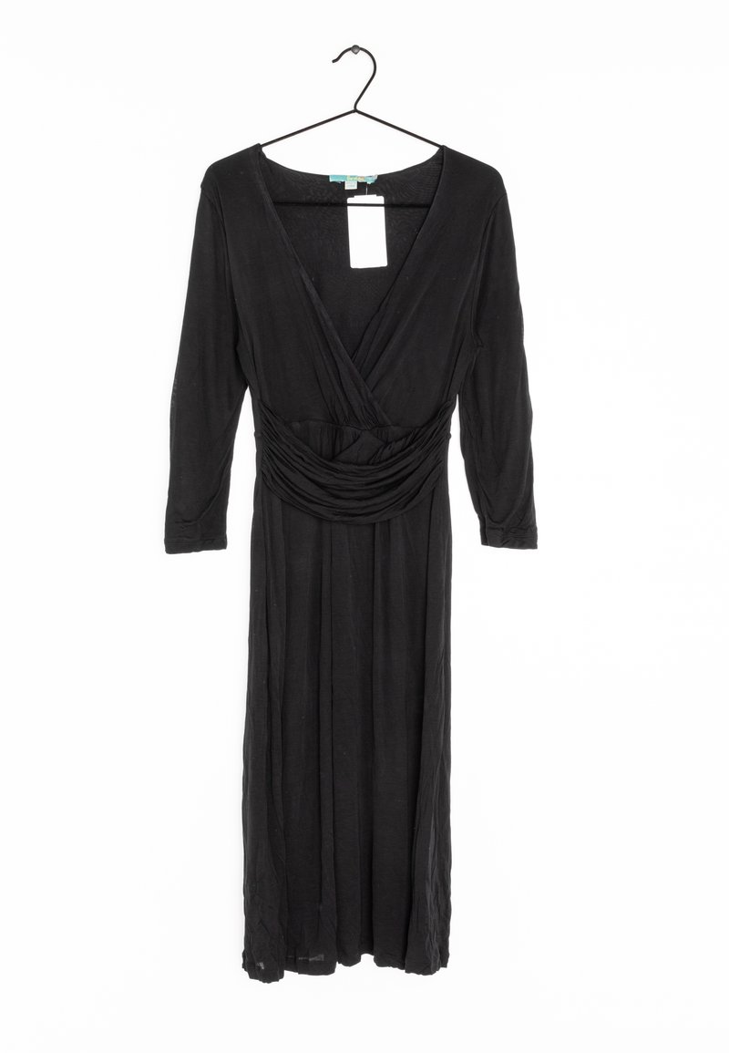 Svart klänning med långa ärmar och djup V-ringning, med insydd midja, tillverkad i mjukt tyg och har en golvlång kjol. Inkluderar en hängande etikett.