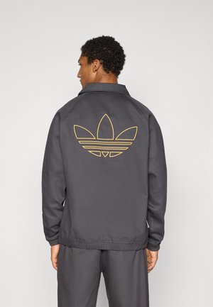 adidas Originals MANCHESTER UNITED ICON - Õuejope - utility black