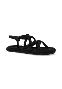 Zwarte touwsandalen met een geweven ontwerp en gekruiste banden. Het oppervlak is structuur, en de zool is plat en flexibel.