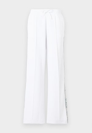 Bílé široké kalhoty s elastickým pasem a šňůrkou, s jemným modrým grafickým vzorem podél vnějších postranních švů.