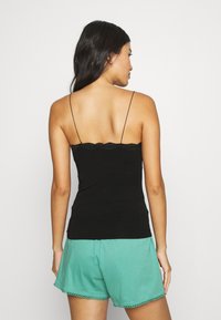 MAGIC Bodyfashion COZY ORGANICS CAMI - Top - black