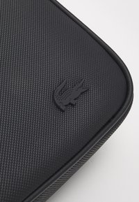 Lacoste Sac bandoulière - noir