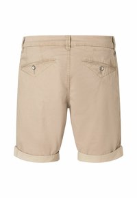 Beige cotton shorts with rolled cuffs, featuring two back pockets with button closures, stitched detailing, and a smooth, soft texture.
