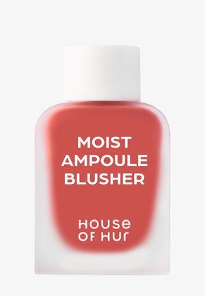 Kleine mattierte Glasflasche mit korallenfarbener Flüssigkeit, beschriftet Moist Ampoule Blusher von House of Hur und weißem Deckel.
