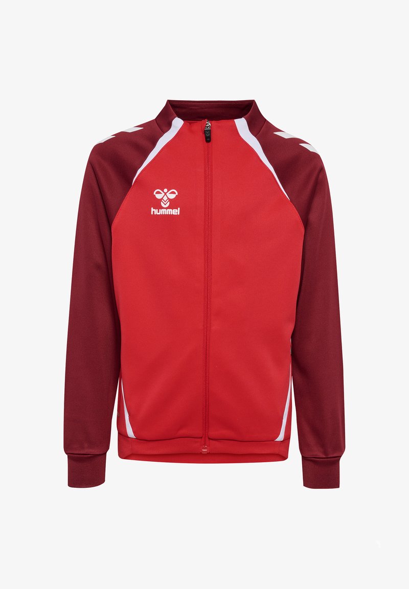 Veste de sport zippée rouge et bordeaux avec des bandes blanches sur les épaules et les côtés, arborant le logo hummel sur la poitrine gauche.