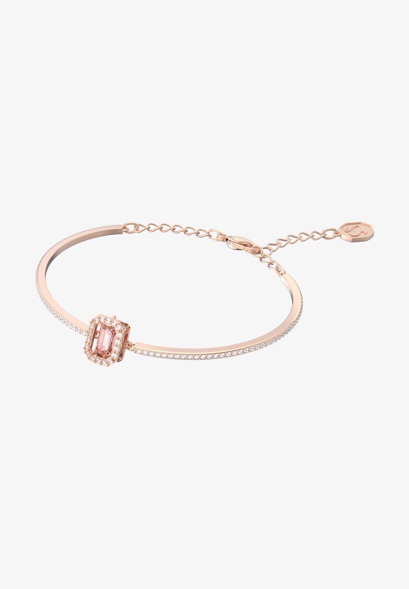 Armband aus Roségold mit einem smaragdgeschliffenen pinken Stein, umgeben von klaren Kristallen. Verfügt über ein glattes Band und einen verstellbaren Kettenverschluss.
