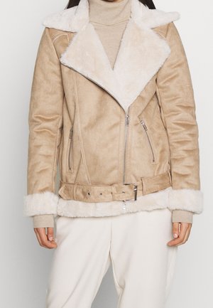 Jacka i konstläder - tan