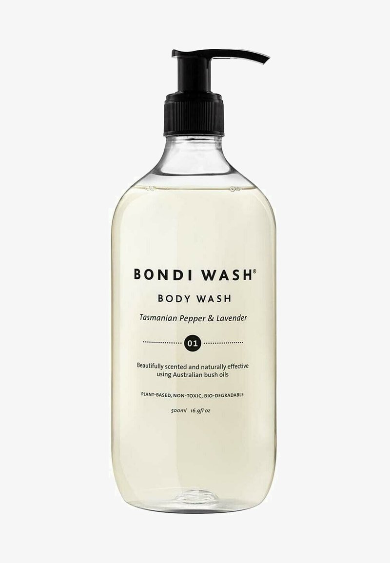 Gel douche Bondi Wash dans une bouteille en plastique clair avec une pompe noire. L'étiquette présente un texte en gras et un design minimaliste. Capacité de 500 ml.