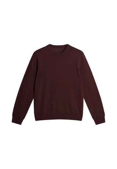 Bordeaux breigoed met een ronde halslijn en lange mouwen. Voorzien van geribbelde manchetten en zoom. Glad textuur, minimalistisch ontwerp.