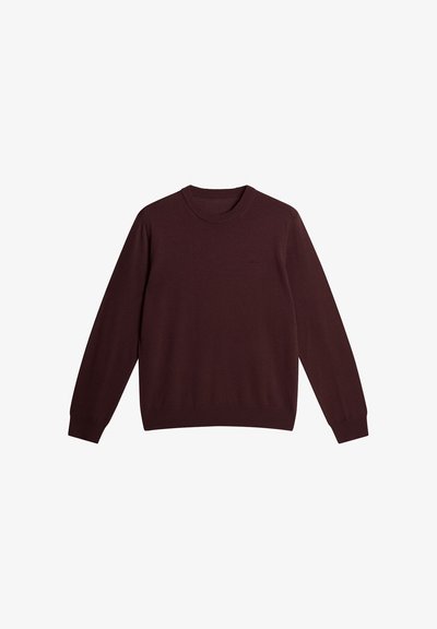 Bordeaux breigoed met een ronde halslijn en lange mouwen. Voorzien van geribbelde manchetten en zoom. Glad textuur, minimalistisch ontwerp.