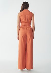 ST MRLO TATE JUMPSUIT - Jumpsuit - rust