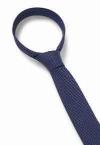 Navy tie made of woven fabric featuring a geometric pattern, with a flat, smooth texture and a standard tie shape.