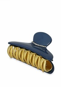 Pince à cheveux en plastique marine avec des accents dorés, présentant un design incurvé et élégant, agrémenté de strass transparents sur la partie supérieure.