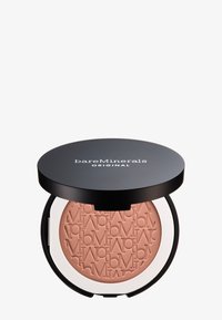 Kompaktpuder in einem schwarzen Case mit einem klaren Boden, das ein strukturiertes pinkes Produkt enthält, das mit dem Markenlogo geprägt ist.