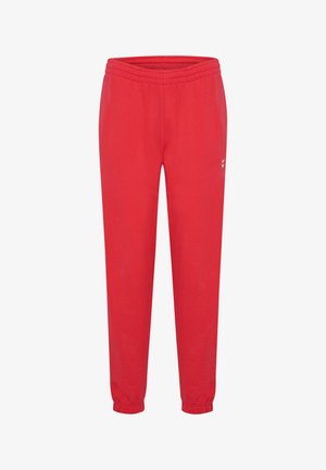 Røde sweatpants lavet af blødt stof, med elastisk talje og ankelsøm, samt en liten hvid logo detalje på siden.