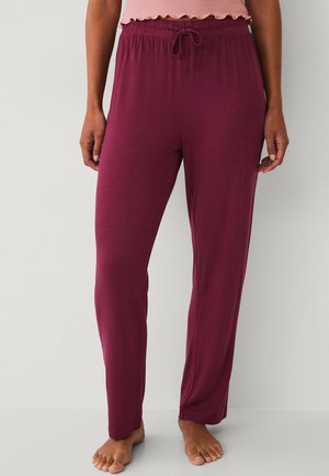 Bordeaux pyjamabukser lavet af blødt, let stof med elastisk talje og snøre. Har desuden et lige ben-design.