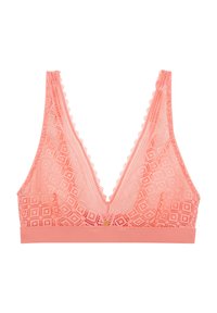 Bralette en dentelle de couleur rose corail avec un décolleté en V profond, un motif géométrique complexe, des bords en dentelle festonnée et une bande solide en bas.