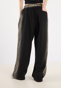 YOURTURN UNISEX - Tréningruha alsók - black