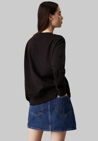 Calvin Klein Jeans INSTITUTIONAL GRAPHIC - Melegítőfelső - black