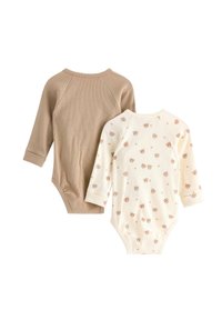 Deux bodies pour bébé : l'un en tissu ribbé beige, l'autre en blanc avec des imprimés d'ours marron clair et des manches unies. Manches longues, en coton doux.
