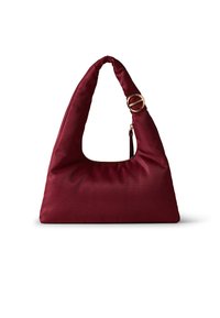 Burgundy shoulder bag with a soft, textured finish, triangular shape, and a gold circular accent on the strap. Zippered compartment included.