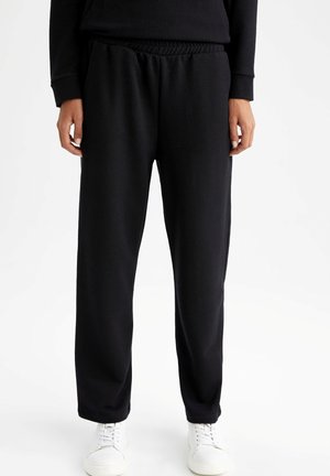 REGULAR FIT - Tracksuit bottoms - black