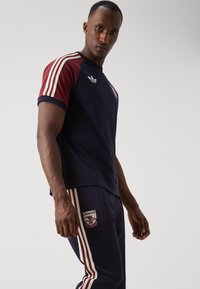adidas Originals ARSENAL LONDON OG BECKENBAUER TRACKPANT - Klupska odjeća - legend ink
