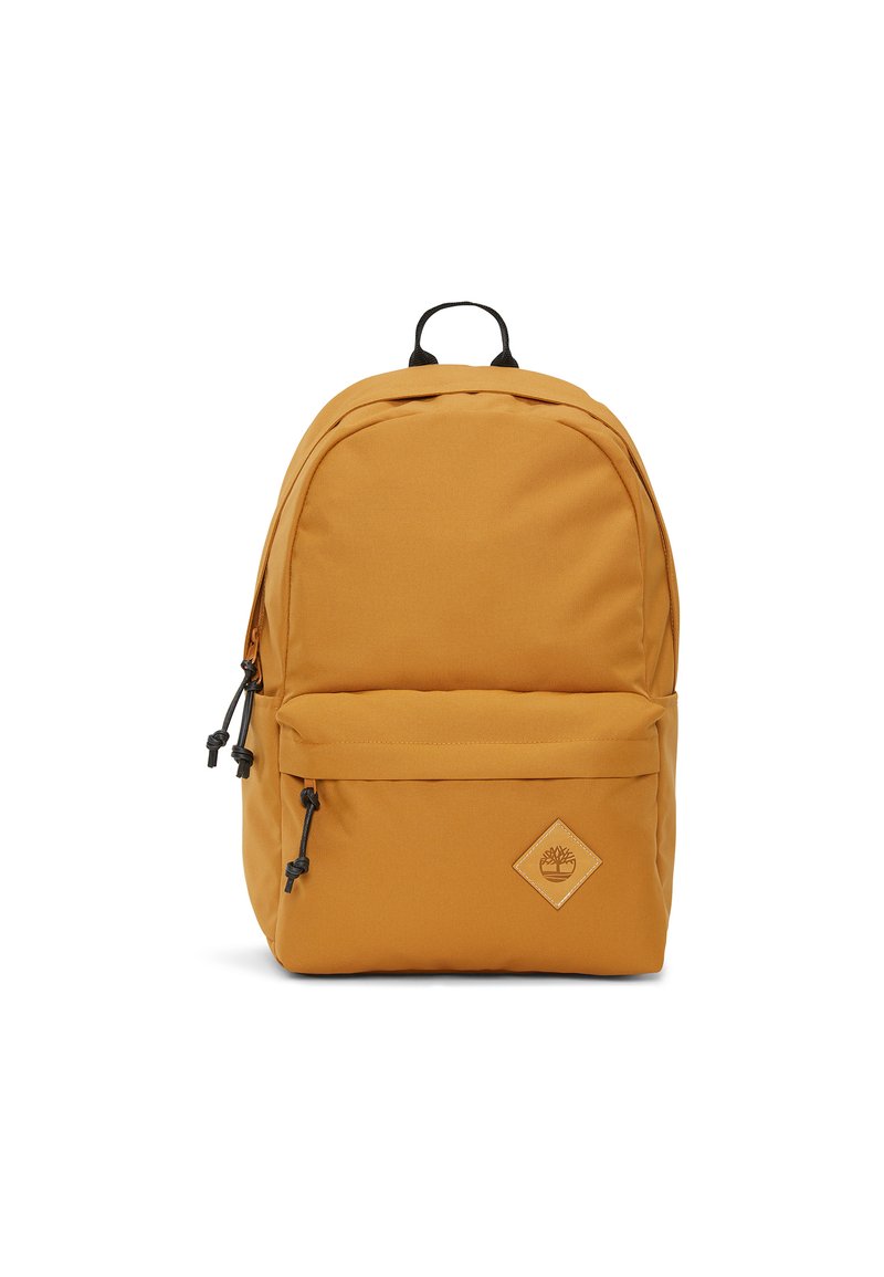 Sac à dos en tissu jaune avec un sommet arrondi, des bretelles noires réglables, une poche frontale et un écusson en forme de diamant.