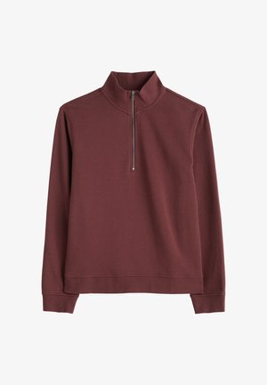 Bordo dolgimi rokavi pulover z dvignjenim ovratnikom in pol zadrgo spredaj, rebrastimi manšetami in robom, enostaven dizajn.