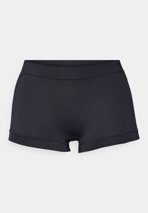 Black swim shorts with a fitted design, smooth texture, and a low waistband. Features a rounded cutout at the back and simple hem.