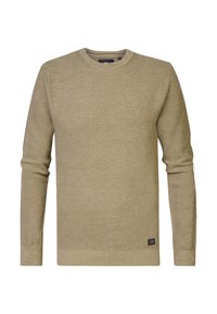 Beige knit sweater with a woven texture, round neck, and long sleeves. Features a small dark logo on the lower front.
