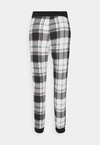 Randiga pyjamasbyxor med ett mönster i svart, vitt och grått med turkosa detaljer, elastisk midja och svarta manschetter.