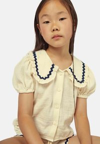 MIPOUNET Shorts - ecru navy