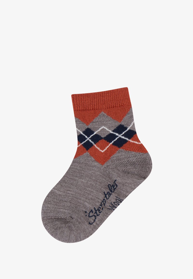 Kindersocke in Grau mit orangefarbener Börtel, orange- und marineblauem Argyle-Muster und marineblauem Text nahe der Zehe, der "Sterntaler" liest.
