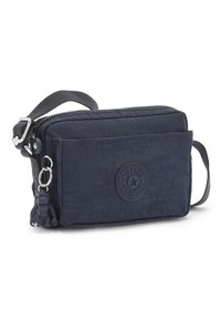 Borsa a tracolla blu navy realizzata in nylon testurizzato. Presenta una chiusura con zip, una tasca frontale e un portachiavi a forma di scimmia come decorazione. Cinghia regolabile.