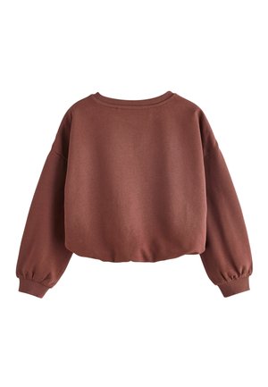 Bordeaux sweater met lange, pofmouwen en een ronde halslijn. Zacht materiaal, relaxte pasvorm en ribbelboord. Geen zichtbare patronen of accenten.