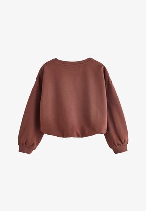 Sudadera burdeos con mangas largas y abullonadas y cuello redondo. Material suave, corte relajado y dobladillo acanalado. Sin patrones ni acentos visibles.